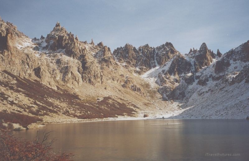 lake ice frozen mountain Refugio Frey